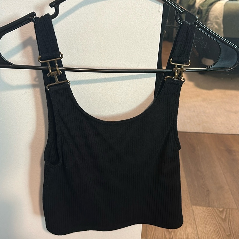 LF black tank top with a metal overall strap style.